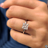 Round moissanite in hidden halo setting for a dazzling look.
