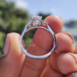 Oval engagement ring with a cathedral setting.