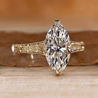 Marquise ring with a tulip setting.