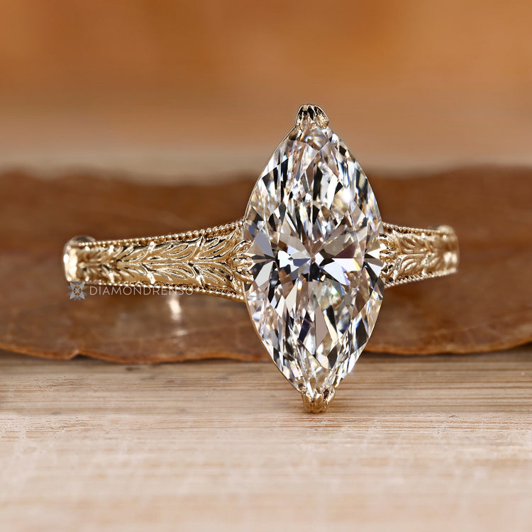 Marquise ring with a tulip setting.