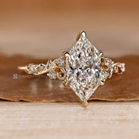 Handmade Dutch marquise ring with round lab grown diamonds.