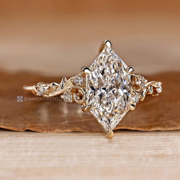 Handmade Dutch marquise ring with round lab grown diamonds.