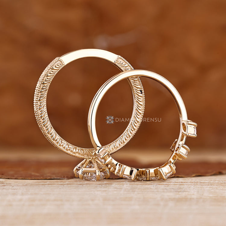 Dutch Marquise ring with ocean waves and claw prong.