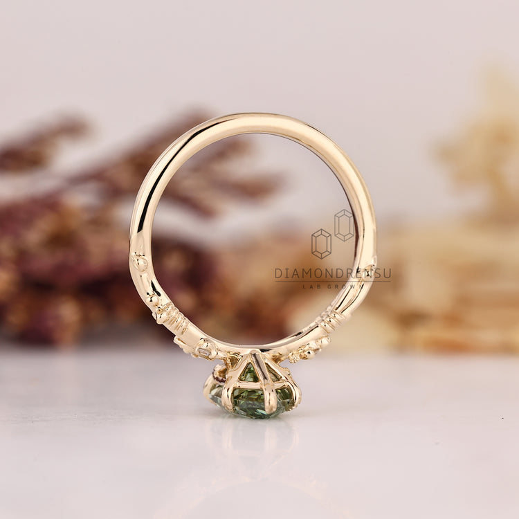 Dutch marquise ring with six leaf prongs and round side diamonds.