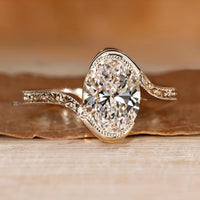 Oval diamond ring in a solitaire style.