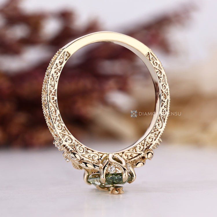 Diamondrensu handmade marquise ring with ornate vintage scrollwork shank.