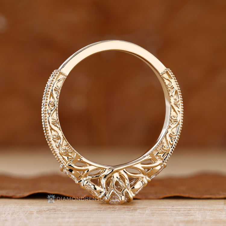 Diamondrensu handmade ring with Muse Setting and milgrain details.