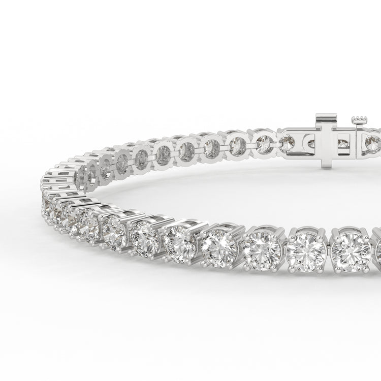 Round cut diamond tennis bracelet with lab diamonds.
