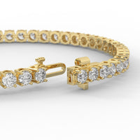 14k yellow gold round diamond tennis bracelet.
