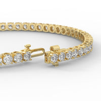 7 inch yellow gold tennis bracelet for women.
