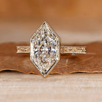 Milgrain details paired with a vintage style bezel setting.