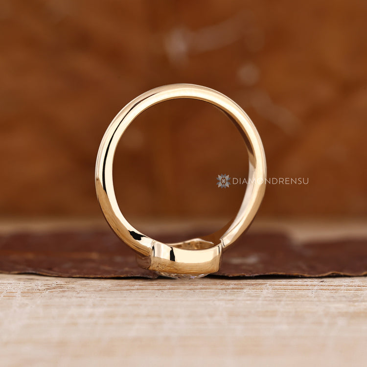 Cushion rose cut diamond ring with secure bezel mount.