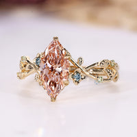 Marquise diamond ring with hidden flower and leaf design.
