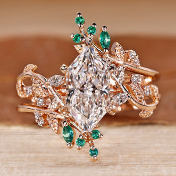 Dutch marquise wedding ring with marquise and round side stones.
