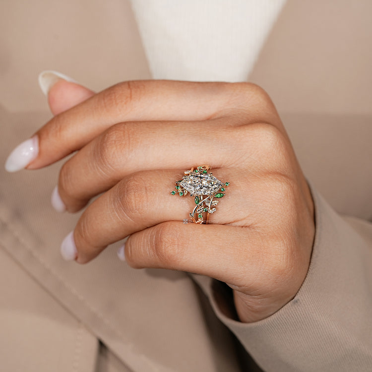Nature inspired bridal set with a bypass setting and Dutch marquise center stone.