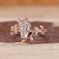 Diamondrensu coffin ring with lab grown diamond center stone.