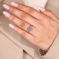 Seven stone coffin ring with kite and round stone accents.