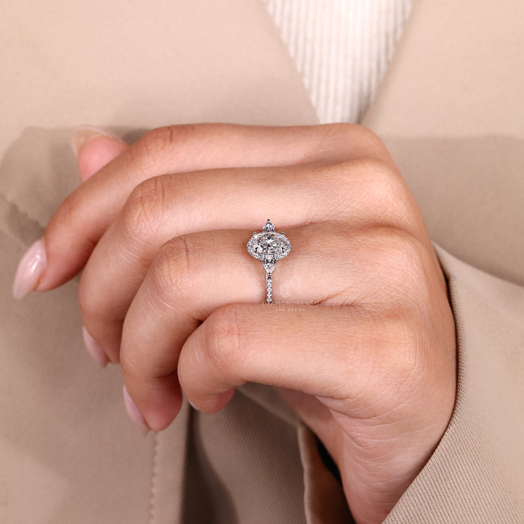 Lab grown oval ring with halo and tapered band.