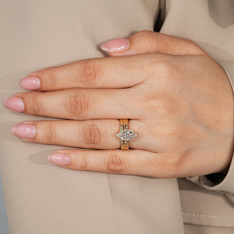 Dutch marquise lab grown diamond bridal set with milgrain details.