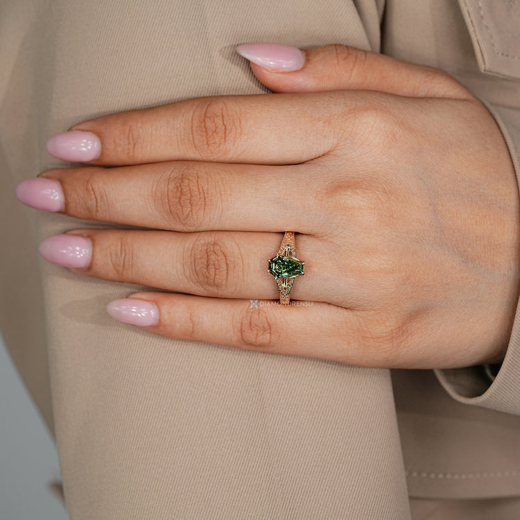 Green Art Deco coffin cut diamond ring with a split shank.