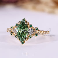 Diamondrensu marquise ring with lab grown diamond center stone.