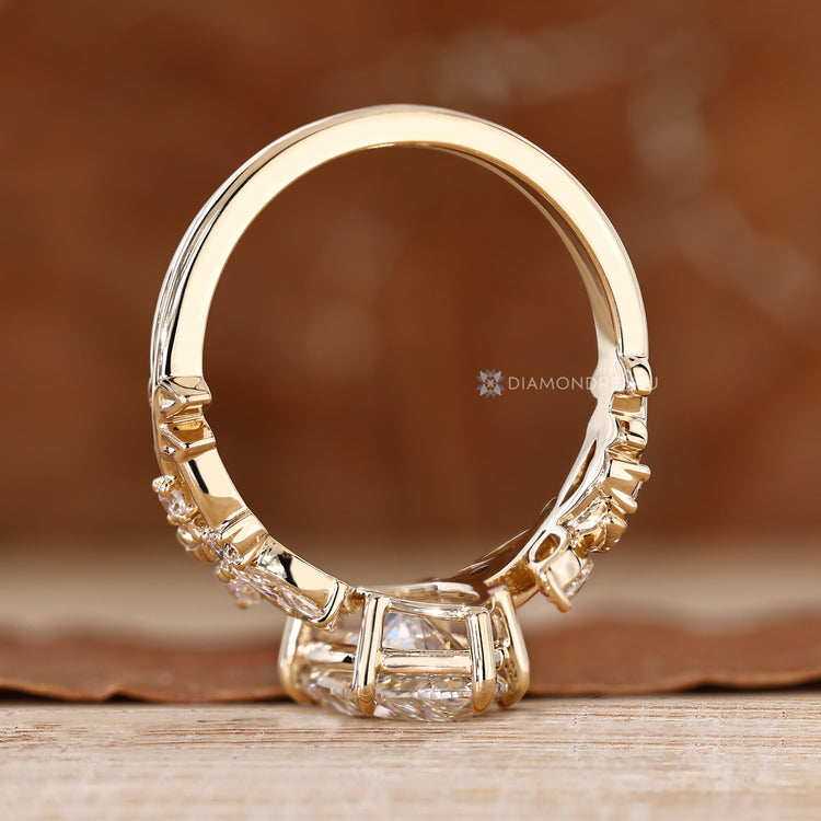 Nature inspired engagement ring with a cluster setting.