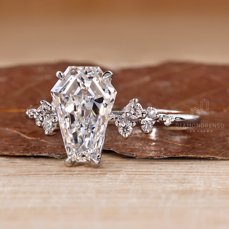 Diamondrensu cluster ring with lab grown diamond center stone.