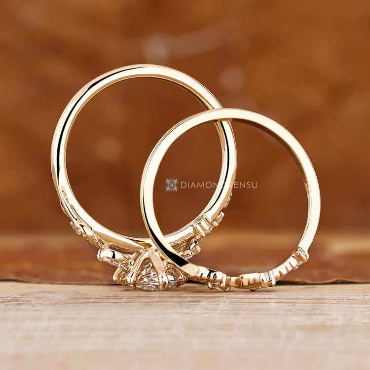 Dutch marquise ring with three stone round diamonds