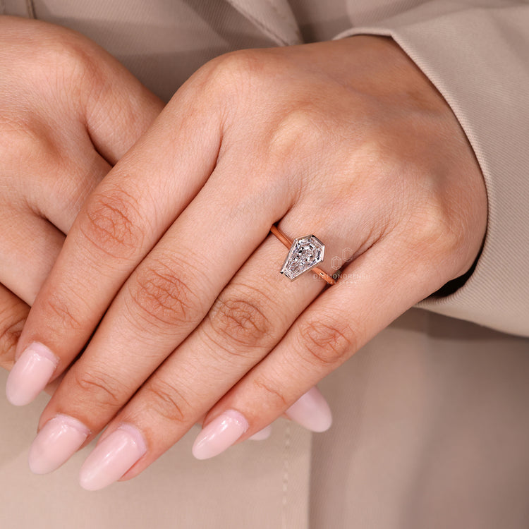 Lab grown diamond ring with coffin cut center stone.
