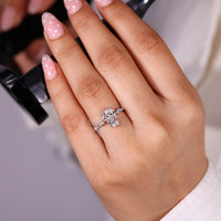 Handmade coffin engagement ring with basket setting design.