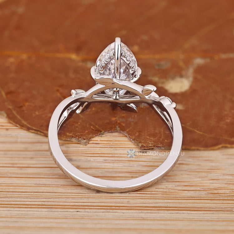 Lab grown diamond ring with compass prongs and hidden halo style.