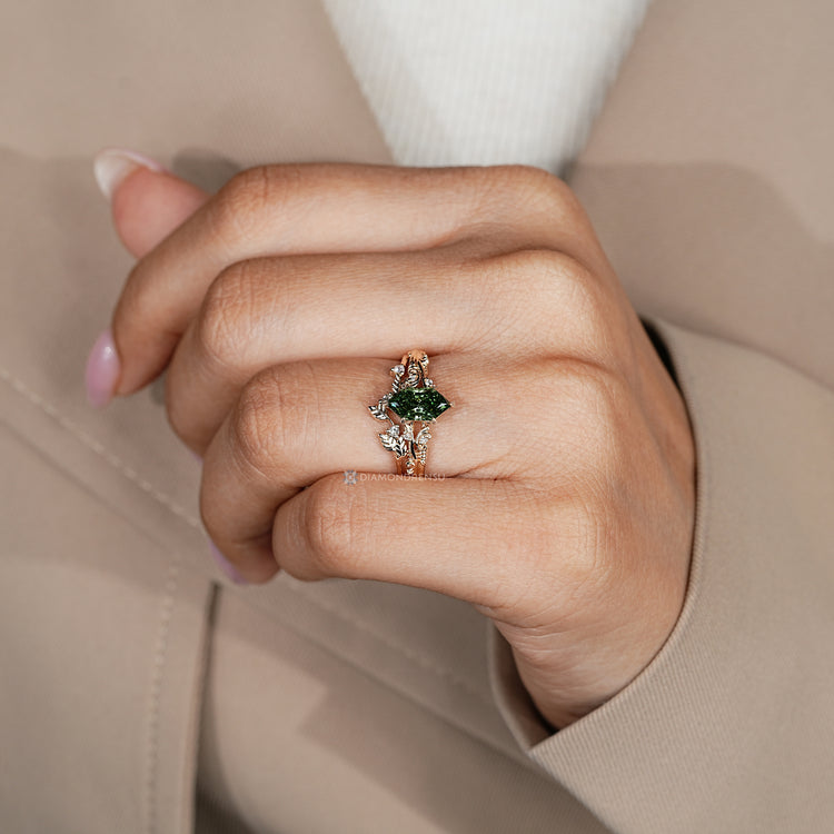 Green Dutch marquise bridal set with six leaf style prongs.