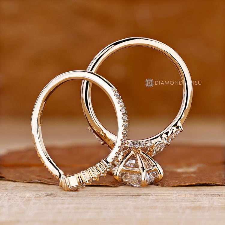 Bridal set combines the Dutch marquise wedding ring with the diamond band.