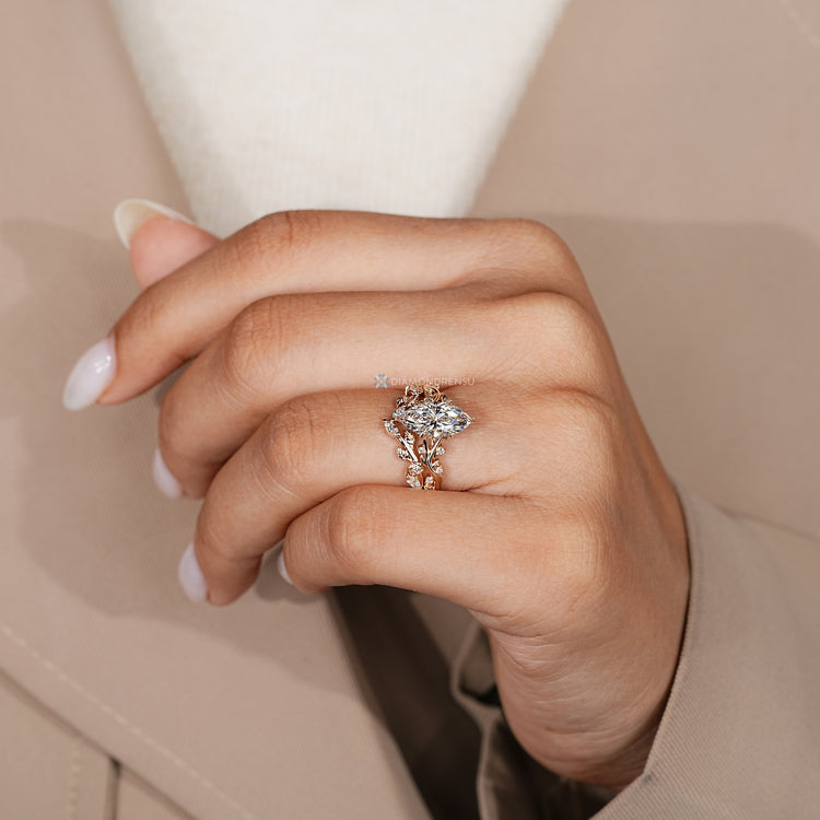Marquise bridal set with a six leaf prong setting.