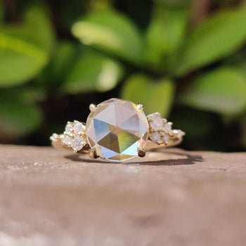 Rose cut moissanite ring set in yellow gold with a handmade finish.
