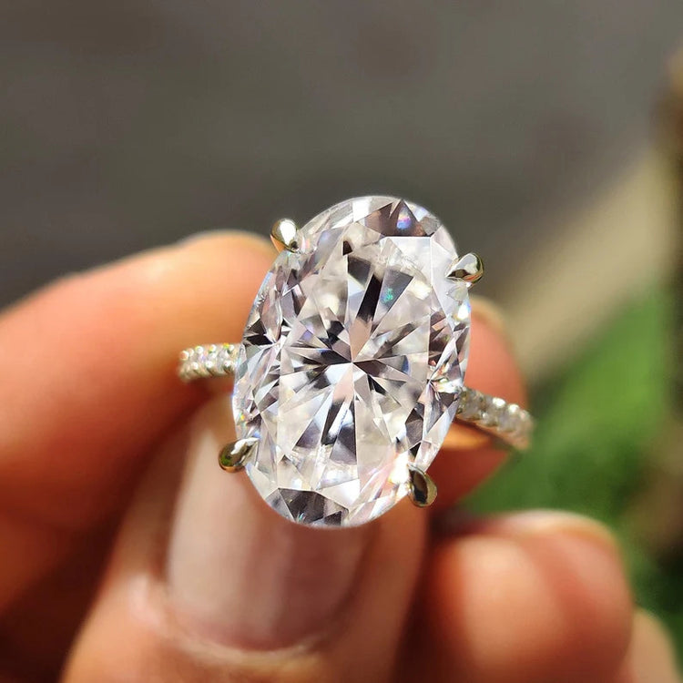 Oval cut moissanite ring designed to shine with timeless beauty.
