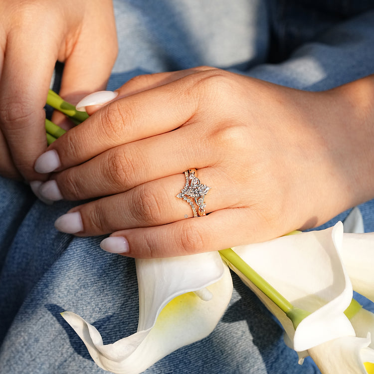 Marquise bridal set with a blooming flower bud setting.