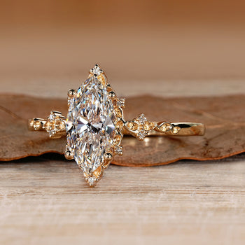 Lab grown marquise diamond ring with four prong design.