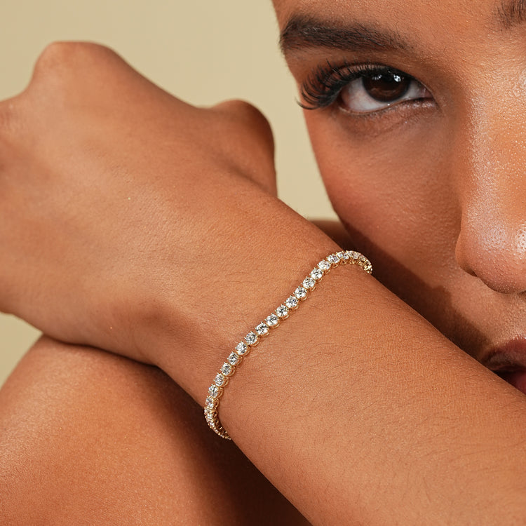 5 carat lab diamond bracelet in yellow gold.
