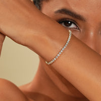 14k yellow gold tennis bracelet with diamonds.
