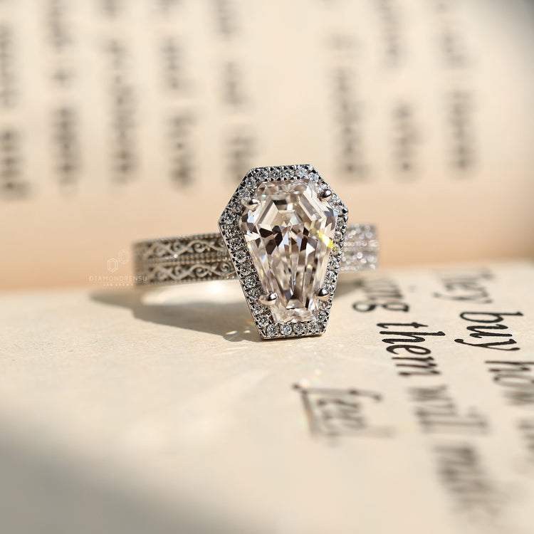 IGI certified coffin cut ring with lab grown diamond and four prong setting.