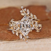 Dutch marquise bridal set with marquise and round side stones.