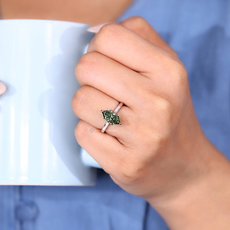 Handmade Dutch marquise engagement ring with cathedral setting.