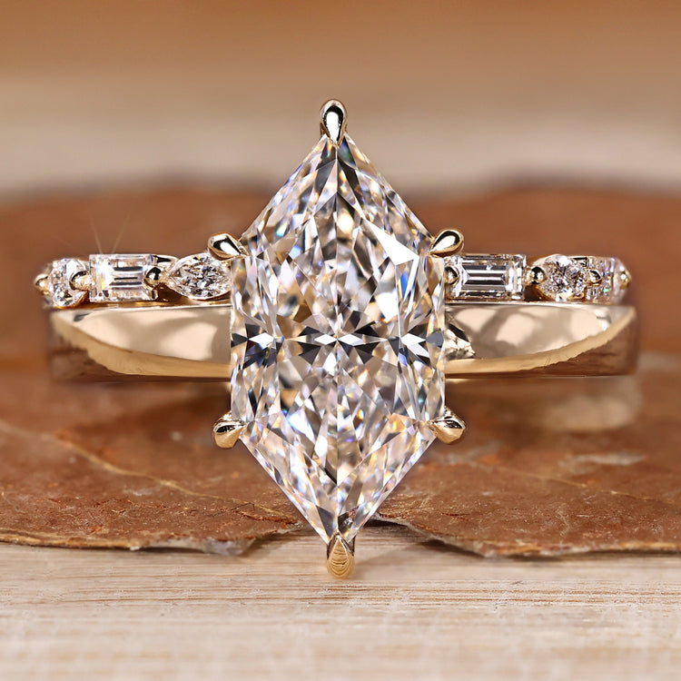 Dutch marquise wedding ring with round cut hidden halo.