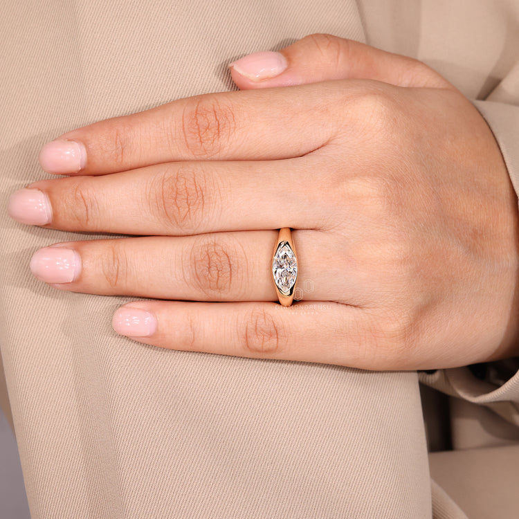 Marquise Cut Engagement Ring in Gypsy Setting