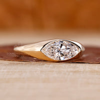 Marquise Cut Engagement Ring in Gypsy Setting