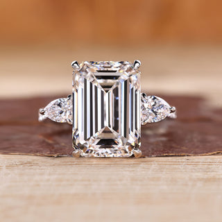 Emerald cut lab grown diamond ring with pear side stones.

