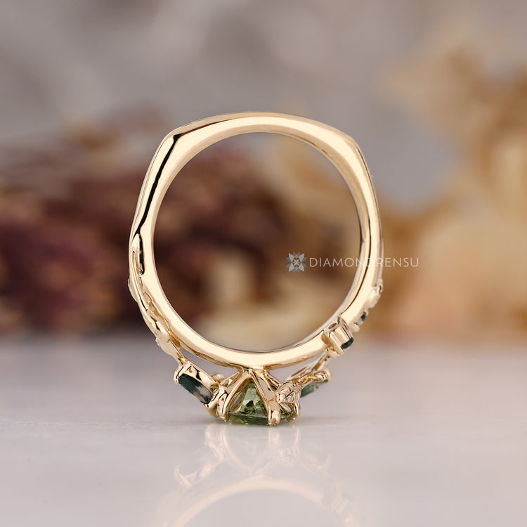 Diamondrensu green marquise engagement ring.