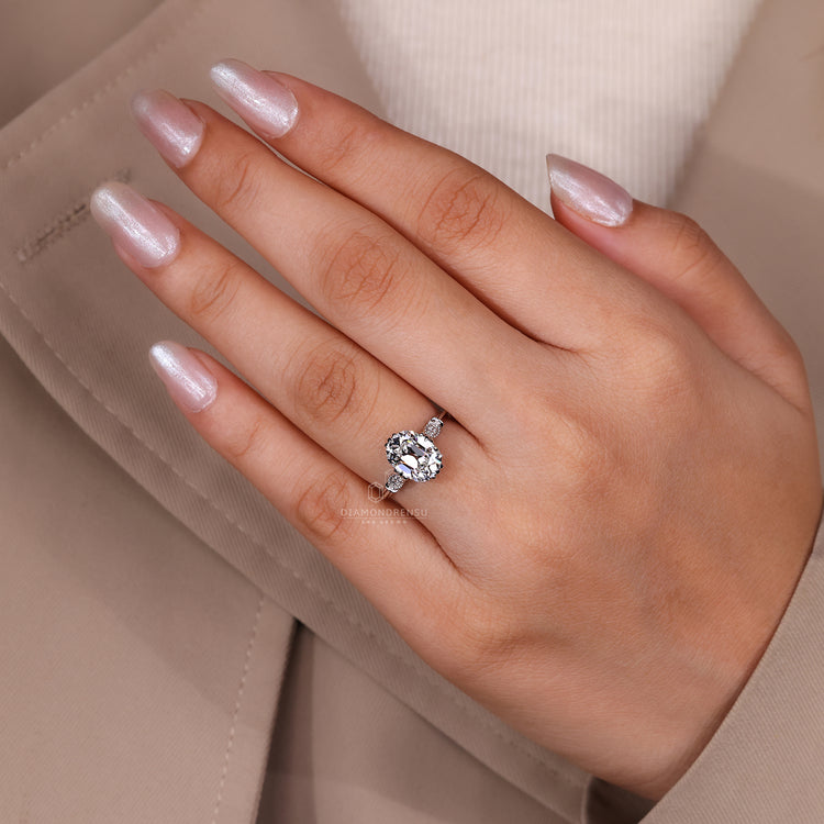 Handmade vintage engagement ring with cushion old mine center.
