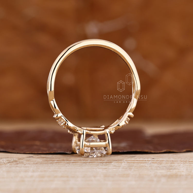 Coffin cut diamond ring with five stone style and prong design.